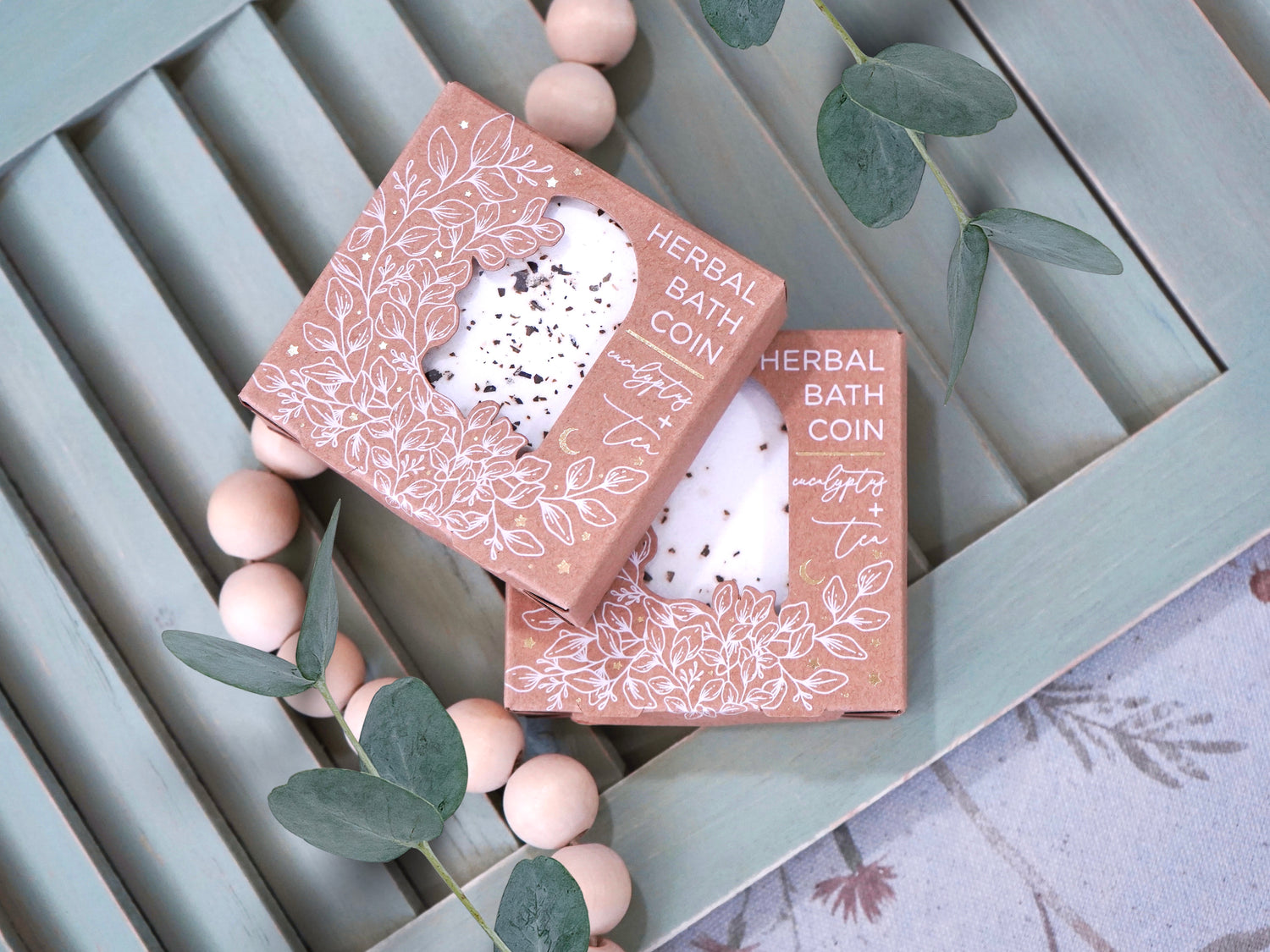 Designed by us at Wildflower Pop, and made exclusively for our shop, a relaxing combination of eucalyptus and herbal tea. 3.5oz. Listing is for one bath coin. Bath coin I shrink wrapper and comes in a brown Kraft box with white floral designs and gold foil accents