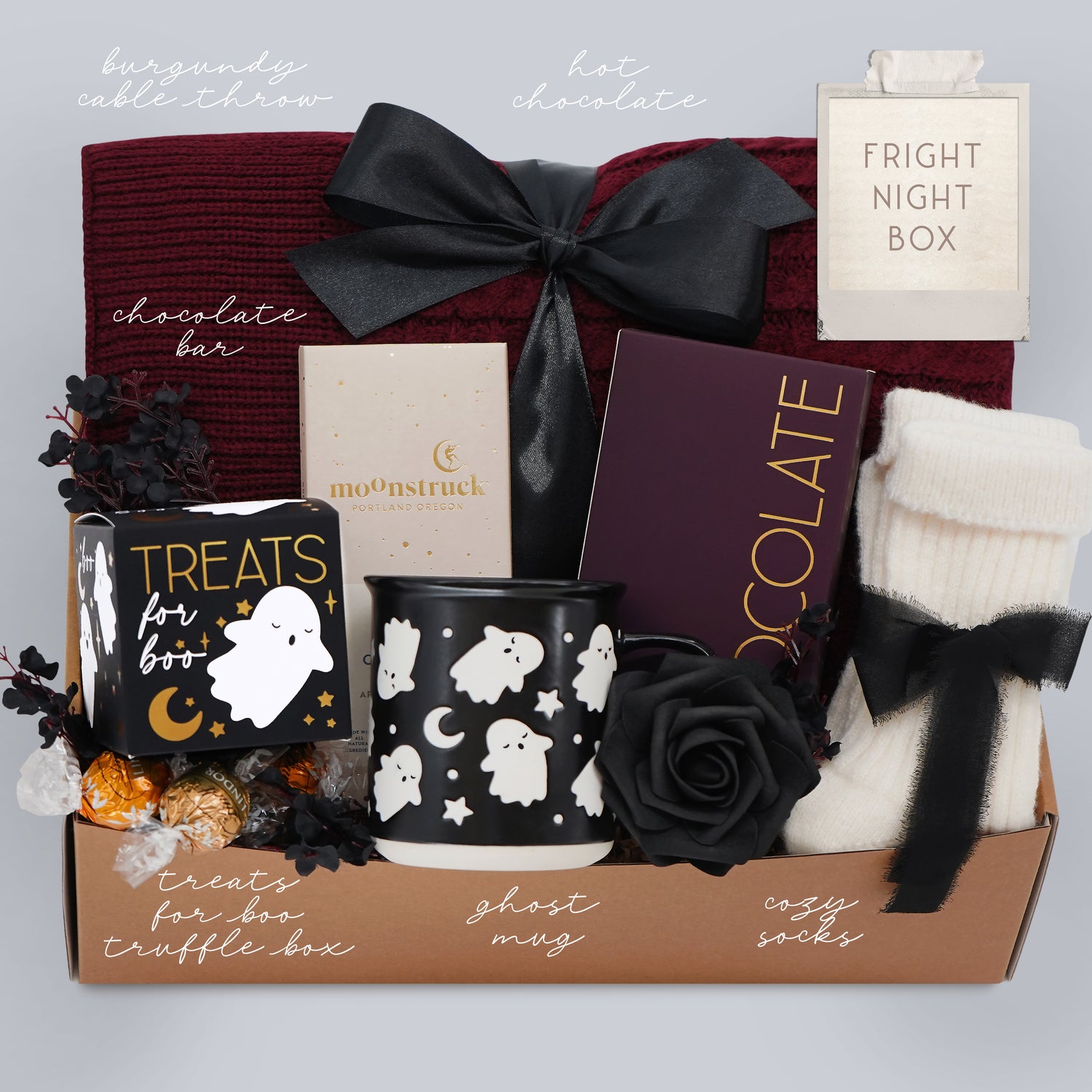 Wildflower Pop Gift basket with Halloween-themed items including a mug, candy, hot chocolate, exclusive ghost mug, a perfect boo box for her