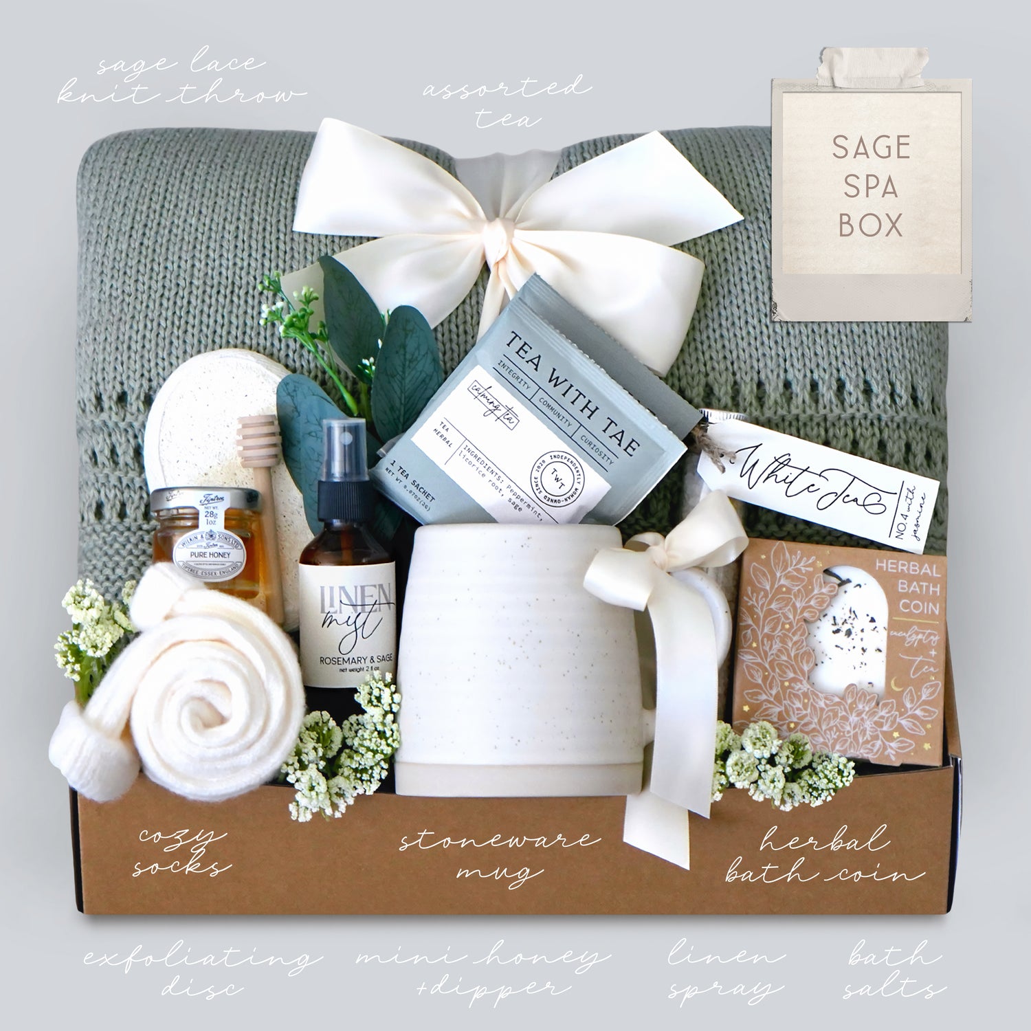 Sage Spa Box with various wellness items including a mug, tea, and bath products.
