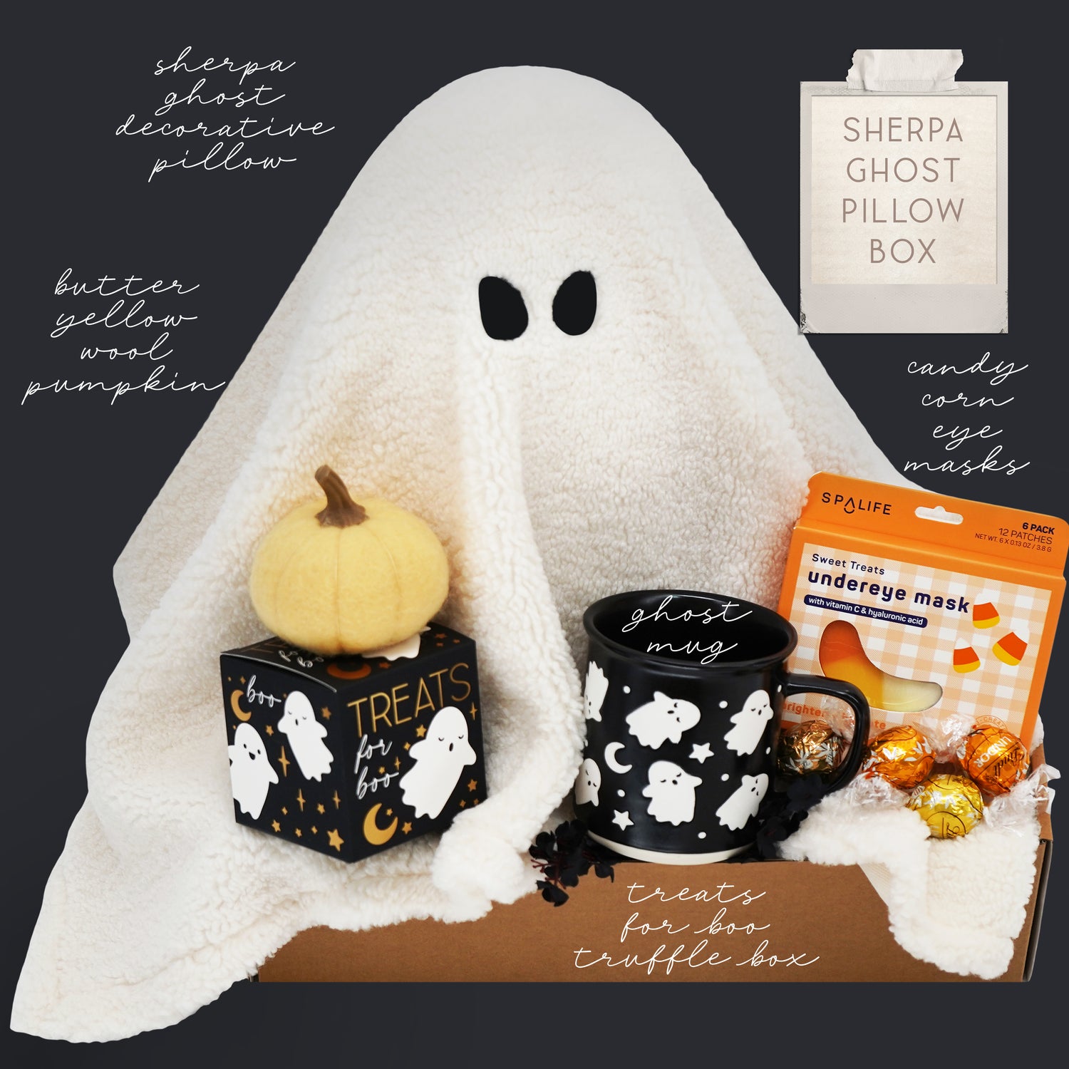 Halloween-themed gift set with ghost pillow, pumpkin, Wildflower Pop Ghost mug, and candy on a dark background.