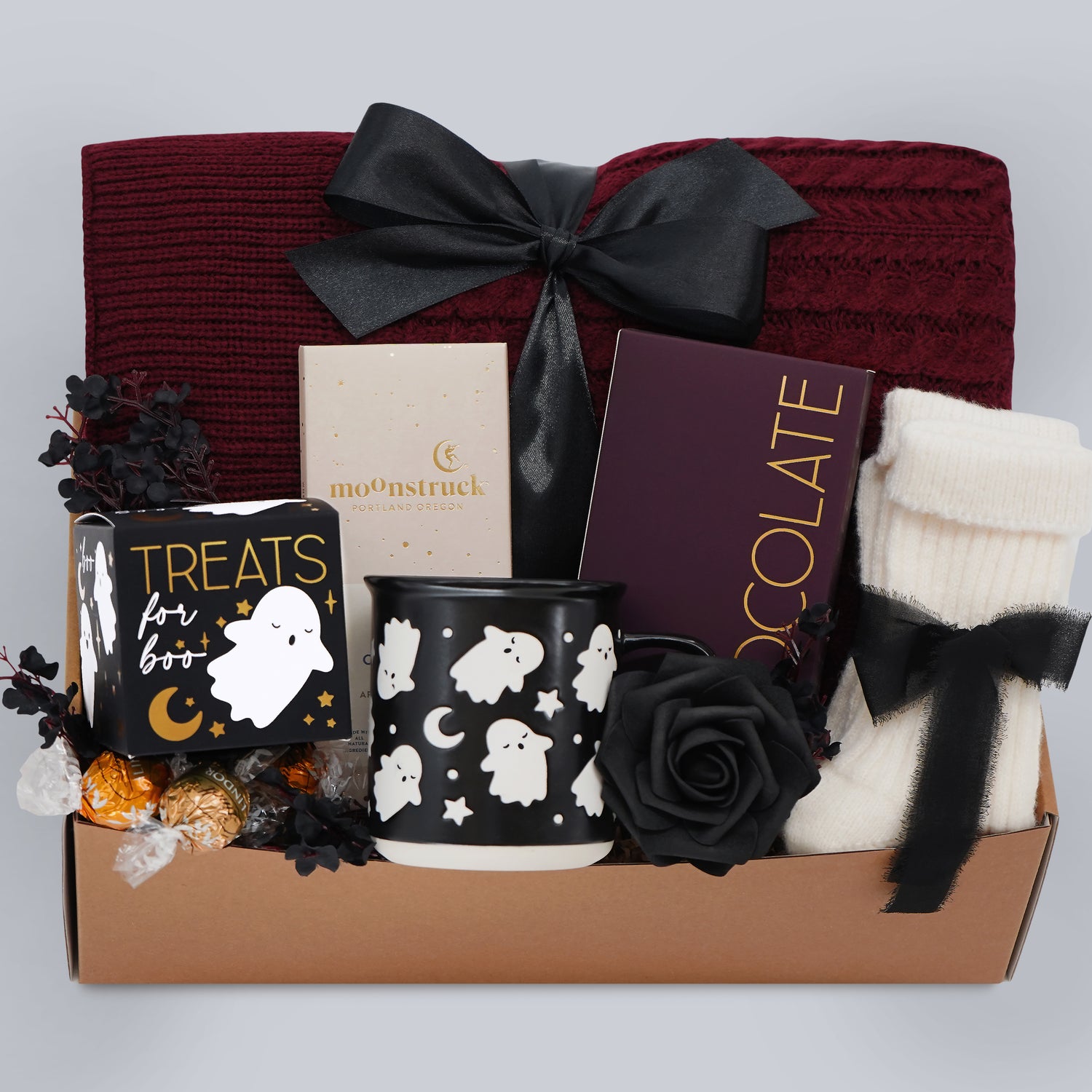 Wildflower Pop Gift basket with Halloween-themed items including a mug, candy, hot chocolate, exclusive ghost mug, a perfect boo box for her