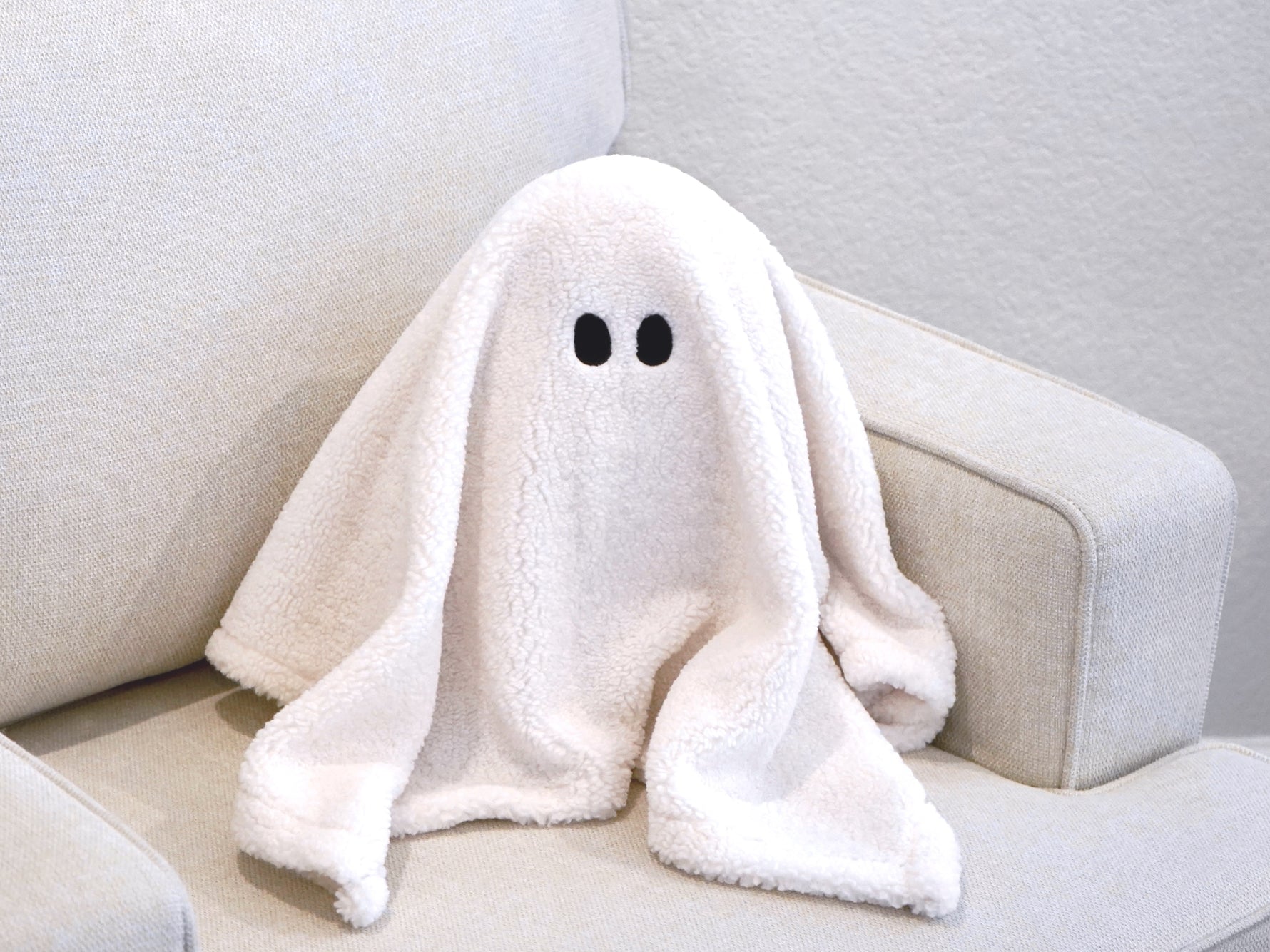 Sherpa Ghost Pillow measures 12"x 13"