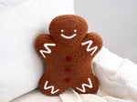 Plush sherpa gingerbread pillow measures 18"x14"