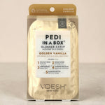 VOESH Pedi in a Box Golden Vanilla pedicure kit on a beige background.