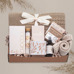 Cozy Comfort blanket gift box by Wildflower Pop with cable knit blanket, mug, cocoa, socks, linen mist, tea and chocolate