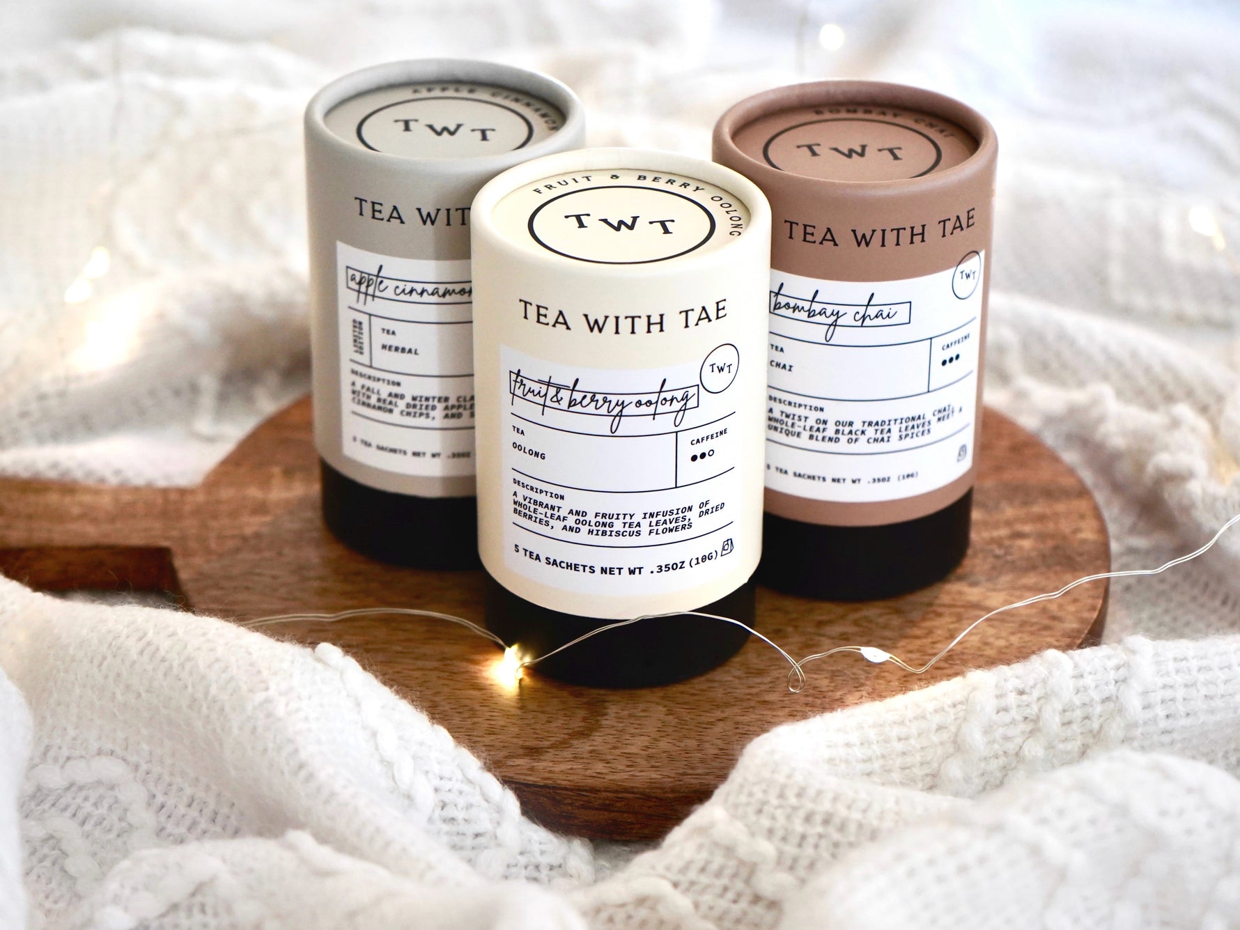 Tea with Tae tea tubes come with 5 tea bags. Flavors shown are apple cinnamon, fruit and berry oolong, and Bombay chai