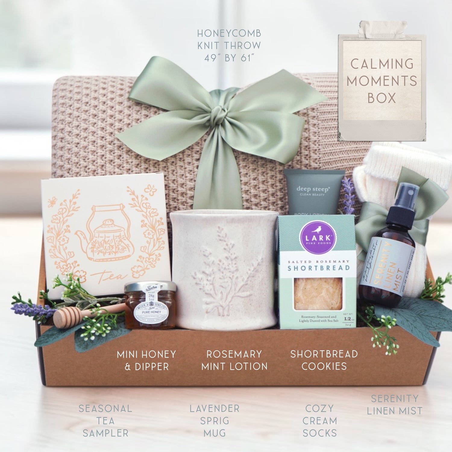 Calming Moments Wildflower Pop knit blanket, mug, tea, cookies, spa items on a light background