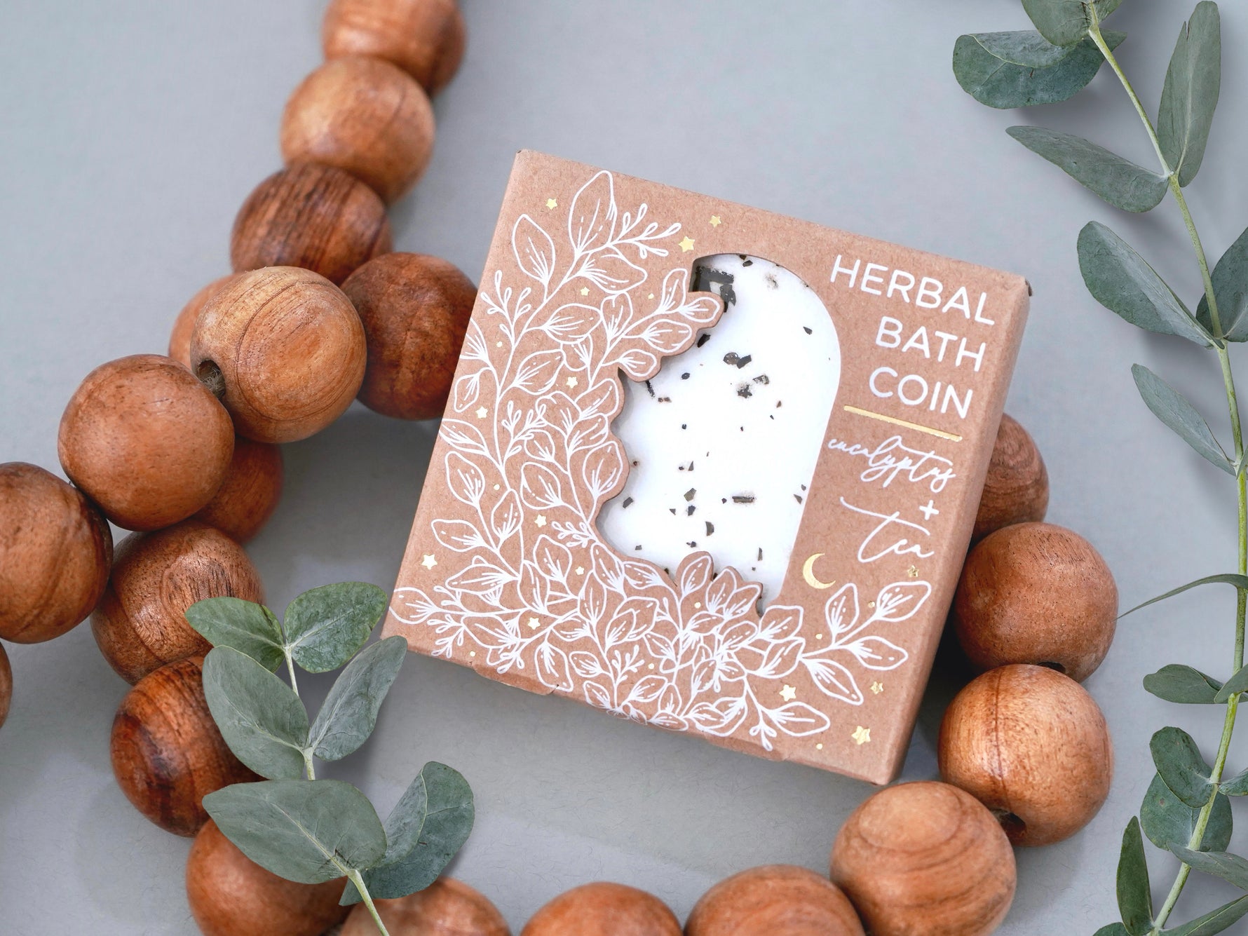 Designed by us at Wildflower Pop, and made exclusively for our shop, a relaxing combination of eucalyptus and herbal tea. 3.5oz. Listing is for one bath coin. Bath coin I shrink wrapper and comes in a brown Kraft box with white floral designs and gold foil accents