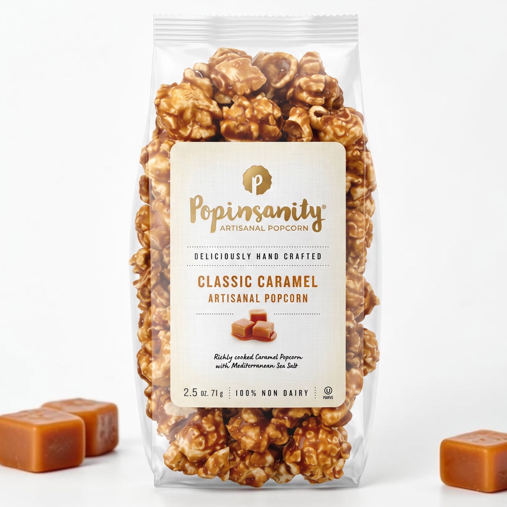A 2.5oz bag of Popinsanity Artisanal Popcorn, Classic Caramel flavor, pictured on a white background.