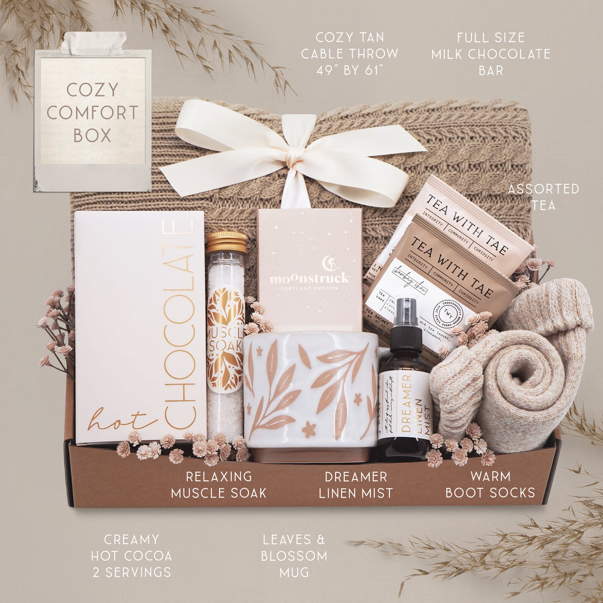 Cozy Comfort blanket gift box by Wildflower Pop with cable knit blanket, mug, cocoa, socks, linen mist, tea and chocolate