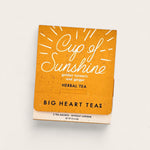 Big Heart Tea Co Cup of Sunshine Tea on beige background