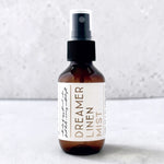 Travel size linen mist Dreamer scent on grey background