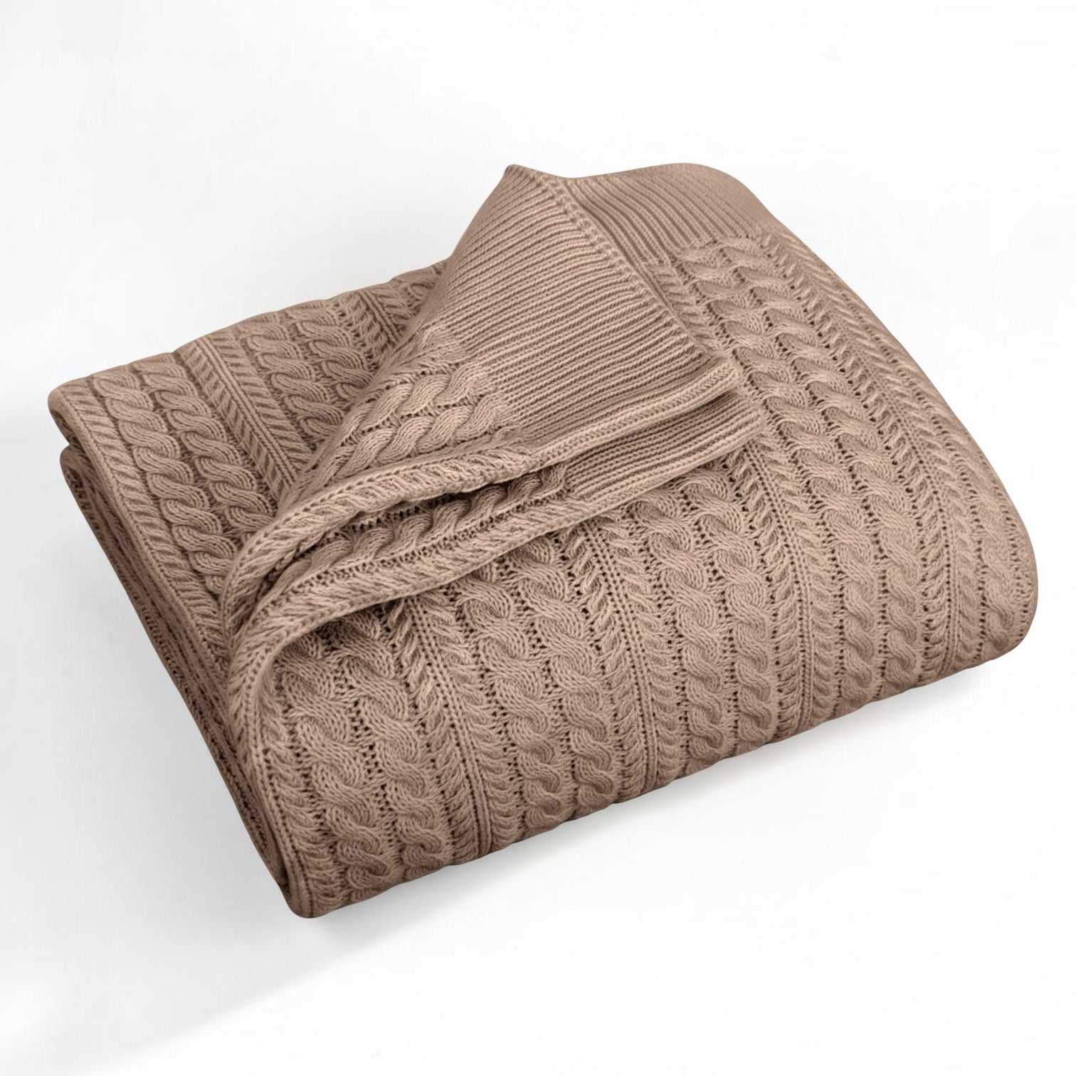 A folded tan-colored cable-knit blanket with a ribbed border, displayed on a clean white background.