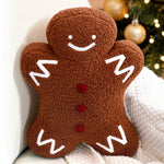 Plush sherpa gingerbread pillow measures 18"x14"