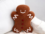 Plush sherpa gingerbread pillow measures 18"x14"