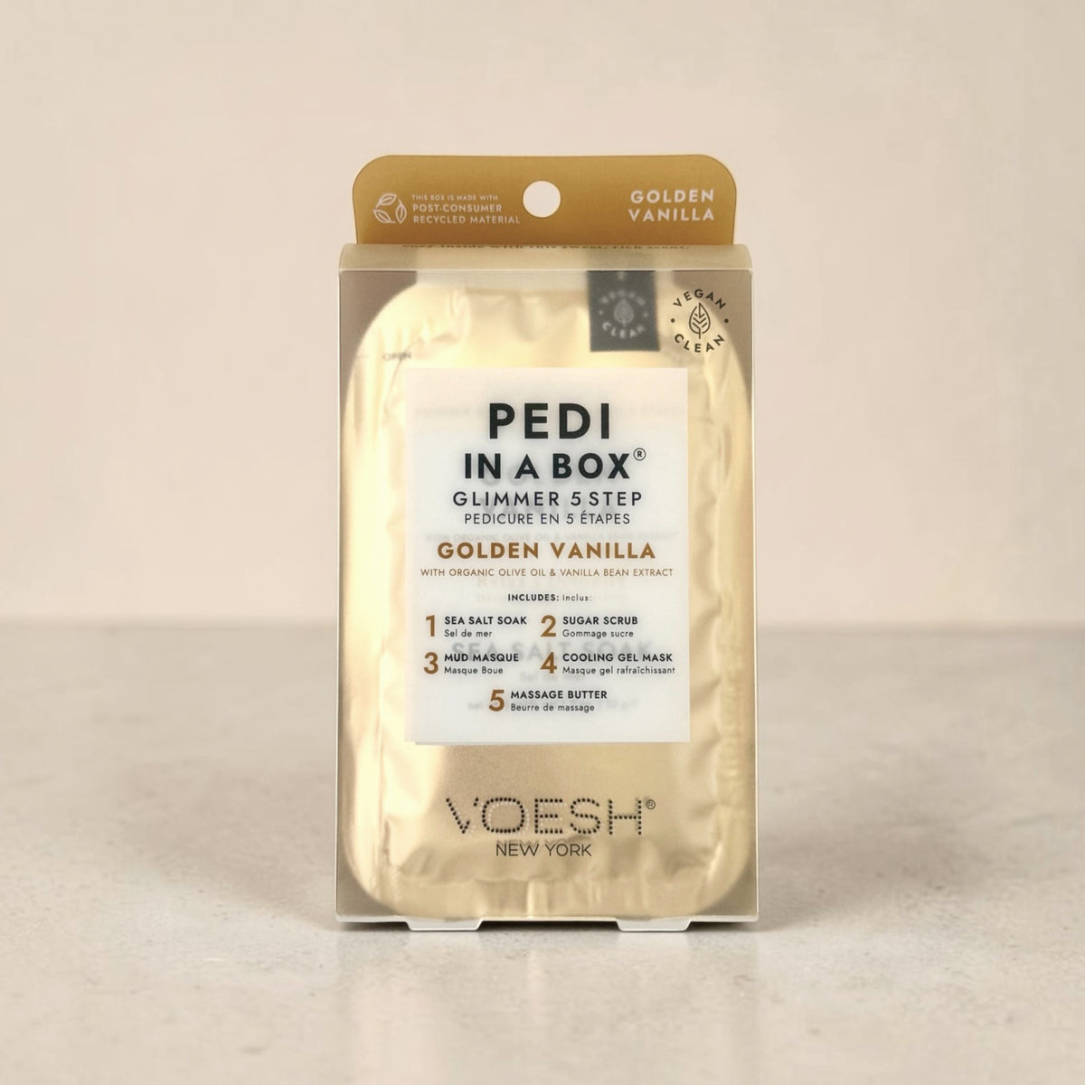Pedi in a Box Golden Vanilla pedicure kit  on a beige background