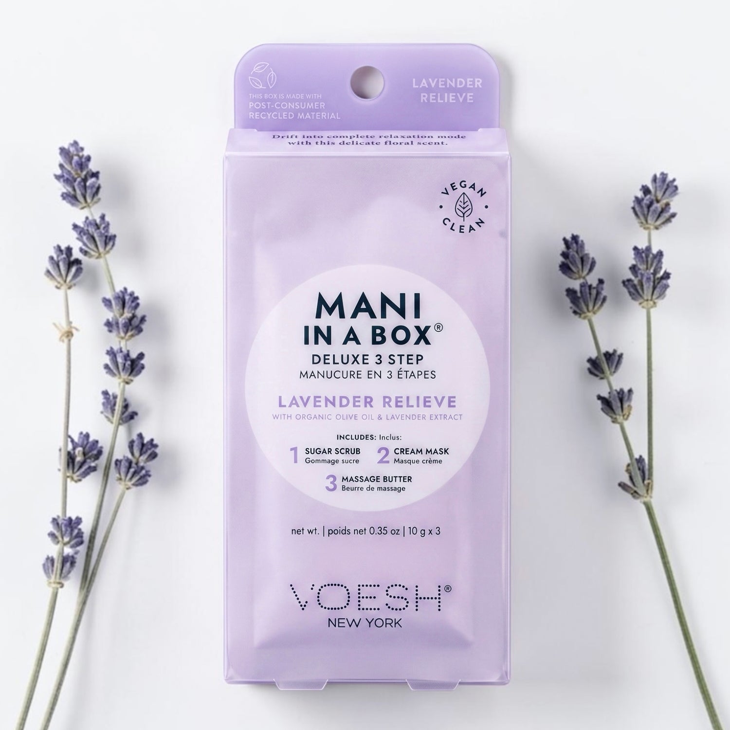 Voesh Mani in a Box Deluxe 3 Step Lavender Relieve manicure set, styled with lavender sprigs on a white background.
