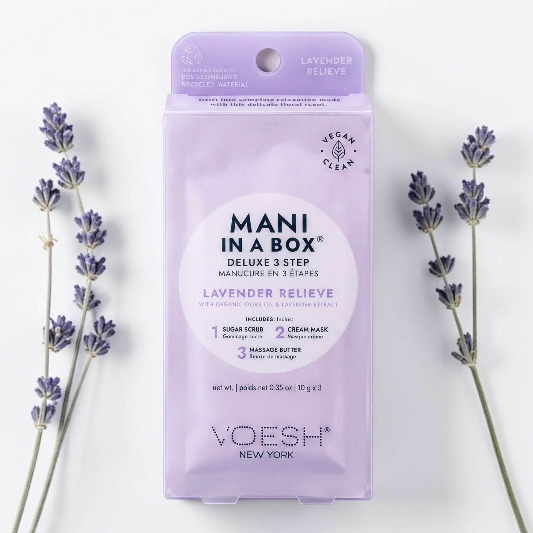 Voesh Mani in a Box Deluxe 3 Step Lavender Relieve manicure set, styled with lavender sprigs on a white background.
