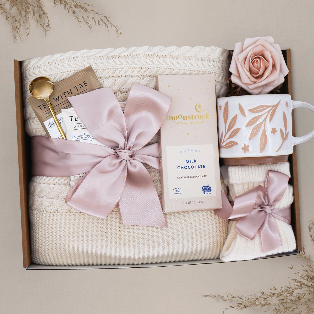 Cherry Blossom blanket gift box by Wildflower Pop with knit blanket, mug, tea and chocolate