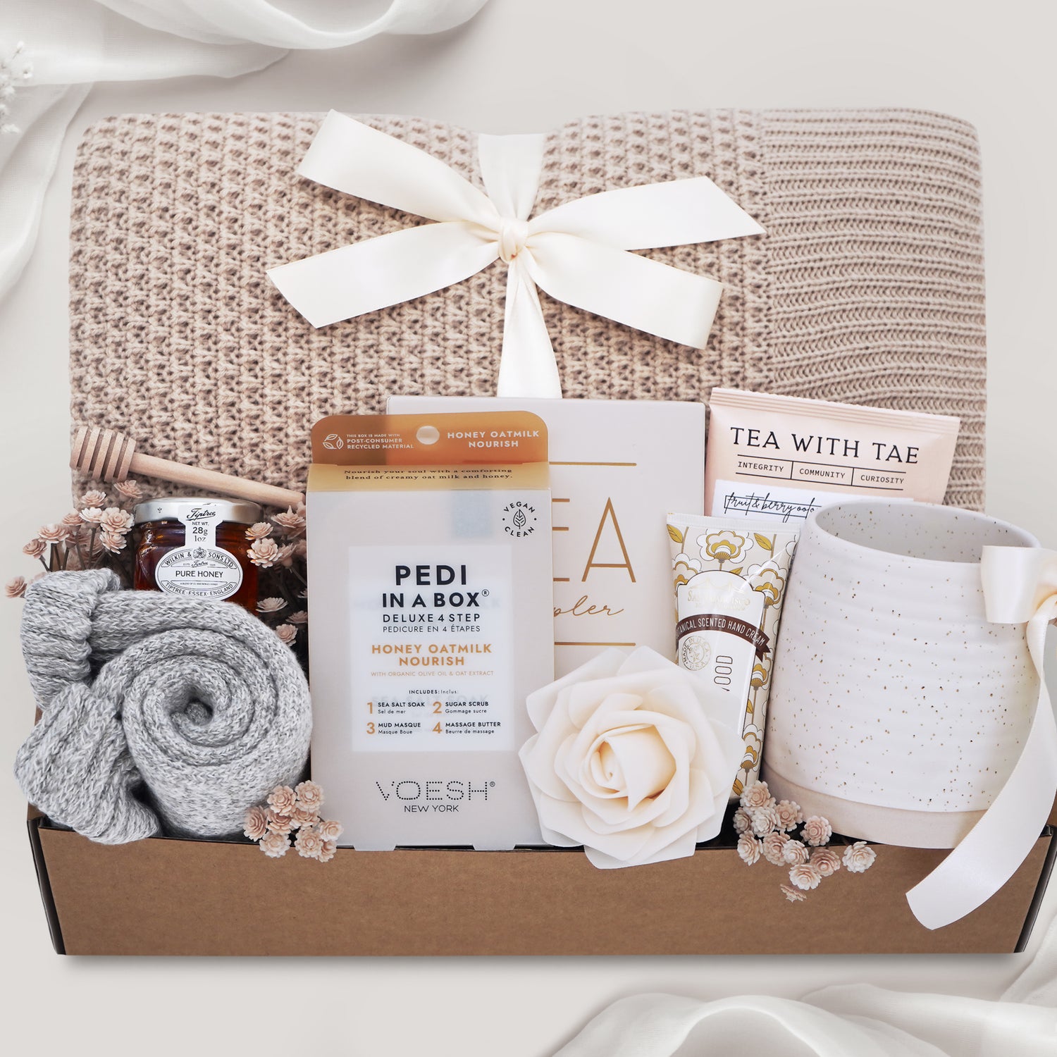 Oatmeal Honey cozy blanket gift box with honeycomb knit throw, tea, mug and spa treats