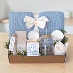 Wildflower Pop Sea Glass & Sea Shell blanket gift box with blue lace knit blanket, coastal spa gifts, and wavy glass tumbler.