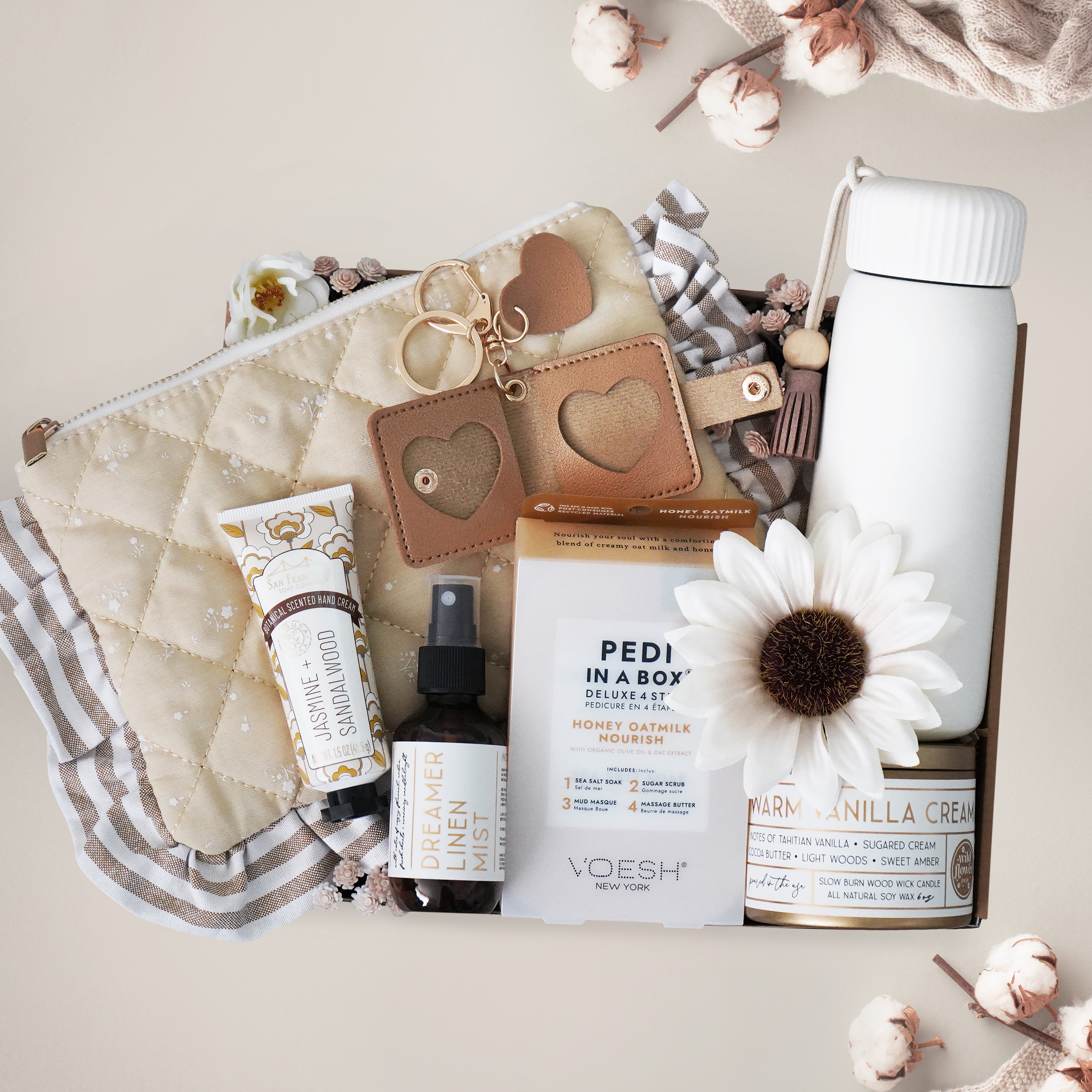 Wildflower Pop Gal on the Go Mug gift box with tumbler, quilted travel pouch, candle, pedicure set, linen mist, hand cream, heart photo bag charm. All ready to gift