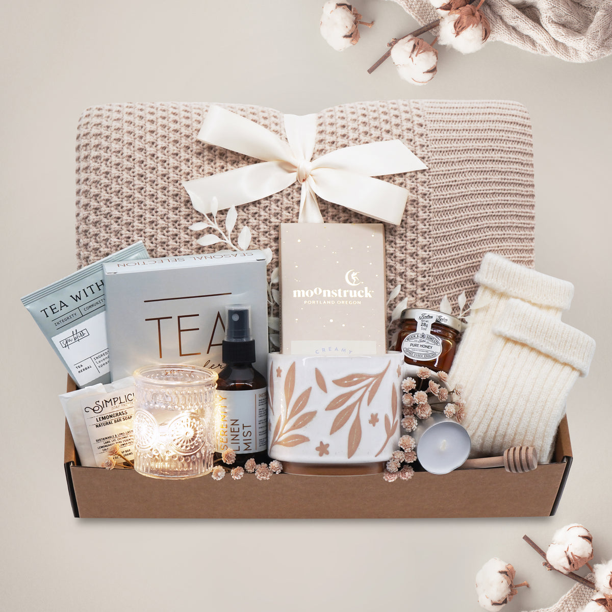 Sand and Sea cozy blanket gift box with honeycomb knit throw, tea, mug and chocolate