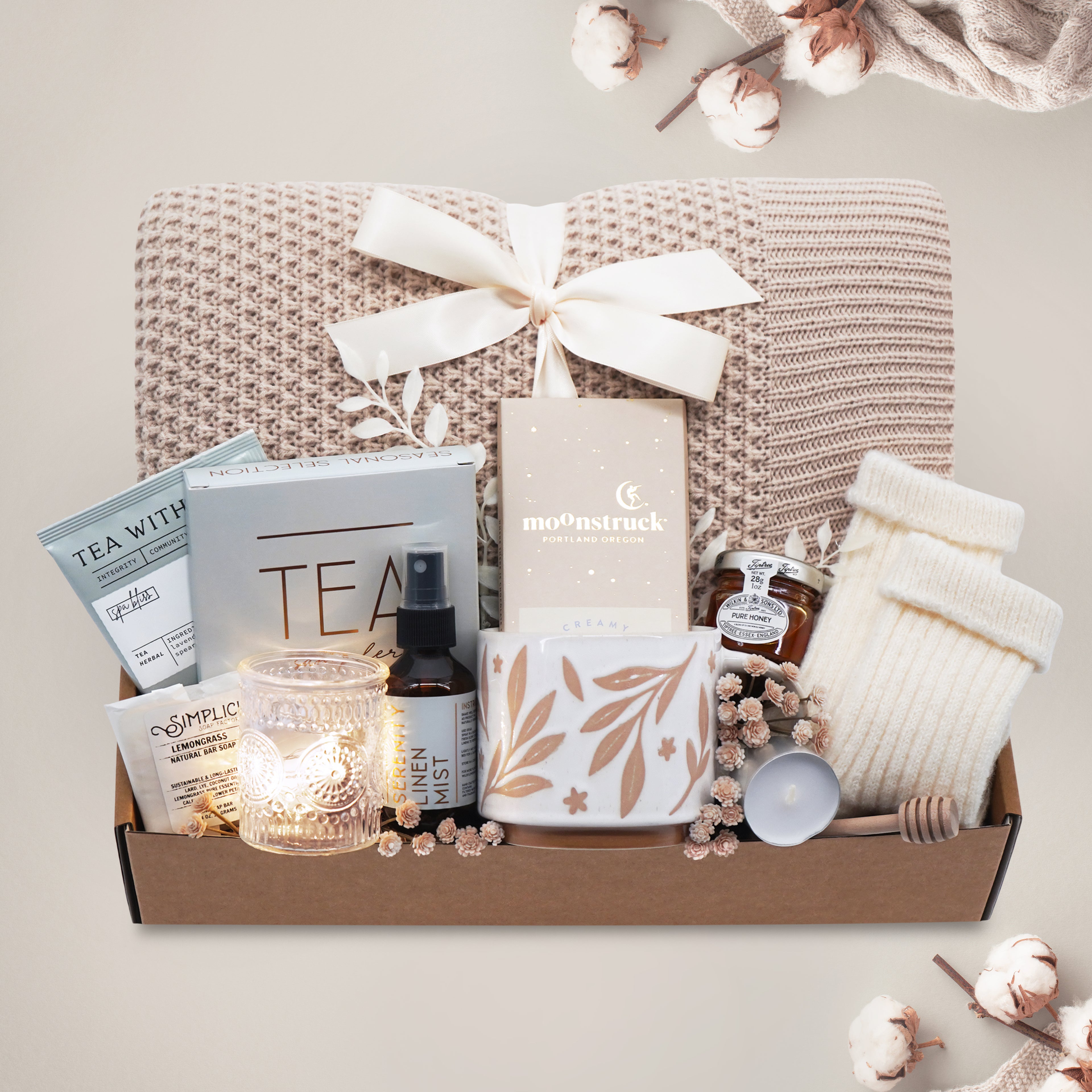 Sand and Sea cozy blanket gift box with honeycomb knit throw, tea, mug and chocolate
