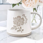 Our custom designed Mama mug with a peony and words: mama on both sides, 12oz dishwasher and microwave safe