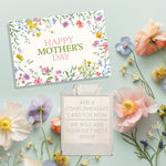 Mother's Day card with floral design and flowers on a light blue background