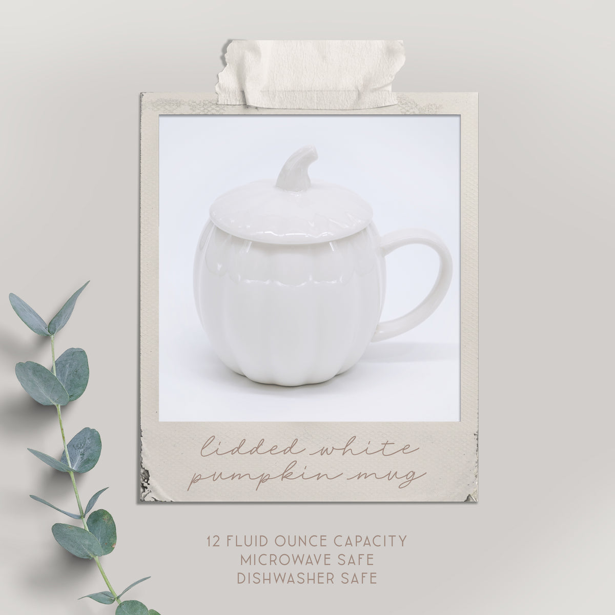 White ceramic mug with lid on a light gray background