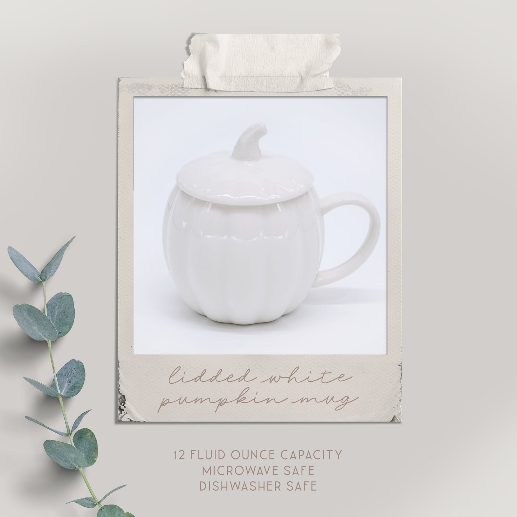 White ceramic mug with lid on a light gray background