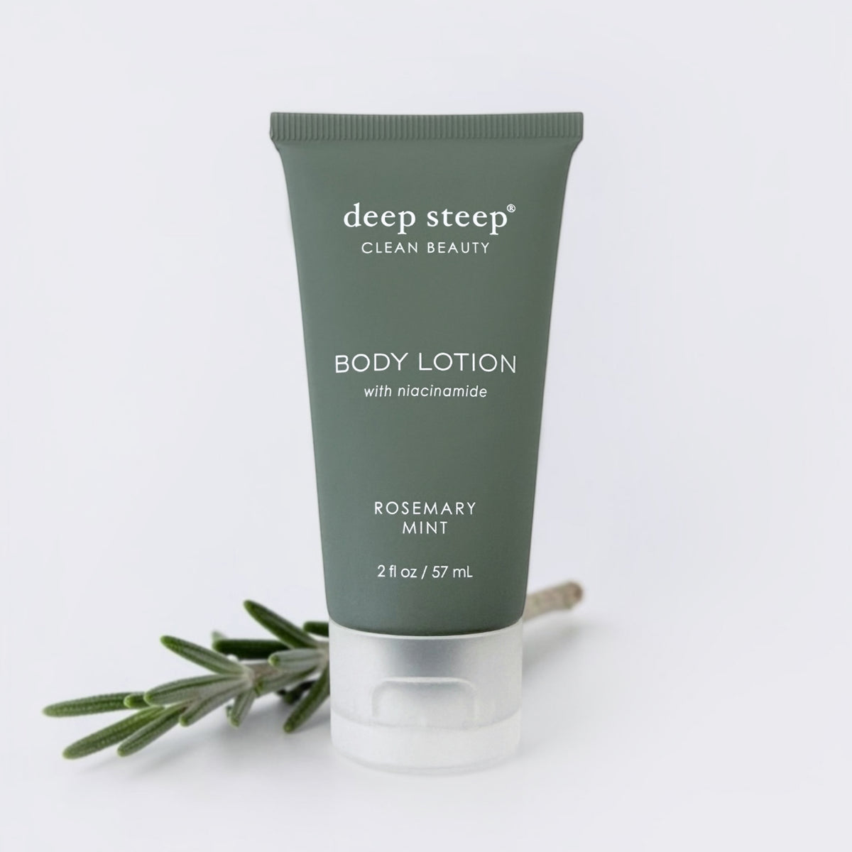 Mini 2oz Deep Steep rosemary mint scented body lotion on grey background