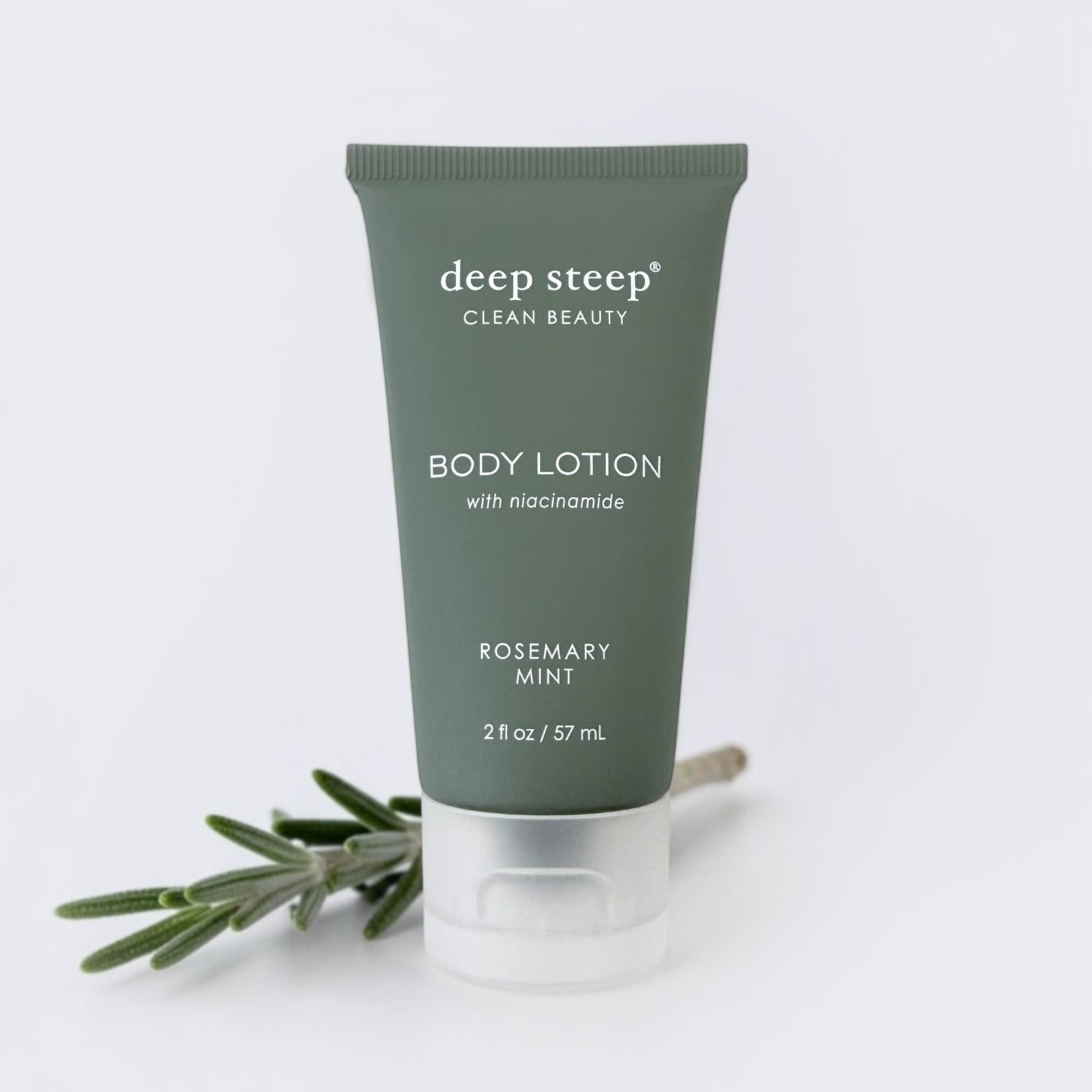 Mini 2oz Deep Steep rosemary mint scented body lotion on grey background