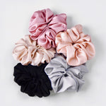 This listing is for ONE jumbo silky scrunchie. Premium fabric and gorgeous colors! These scrunchies measure about 5" across.

Fabric color options are as follows: - Tea Rose (mauvy-pink) - Blushing (pale blush pink) - Milk Tea (warm grey-pinky-beige) - Silver Moon (icy grey) - Midnight (classic black)
