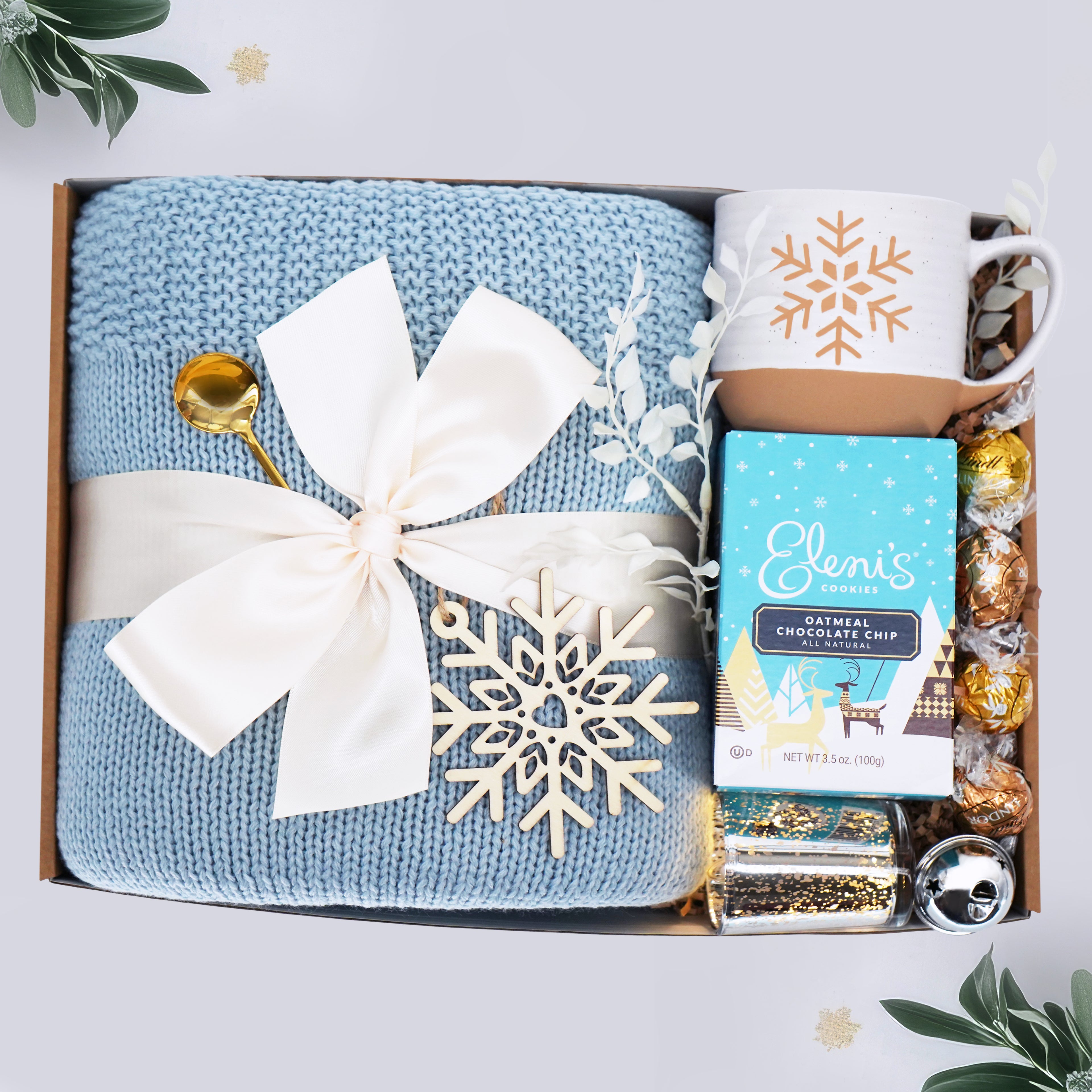 Wildflower Pop Snow Much Fun Gift set with blue blanket, mug, and snacks in a box