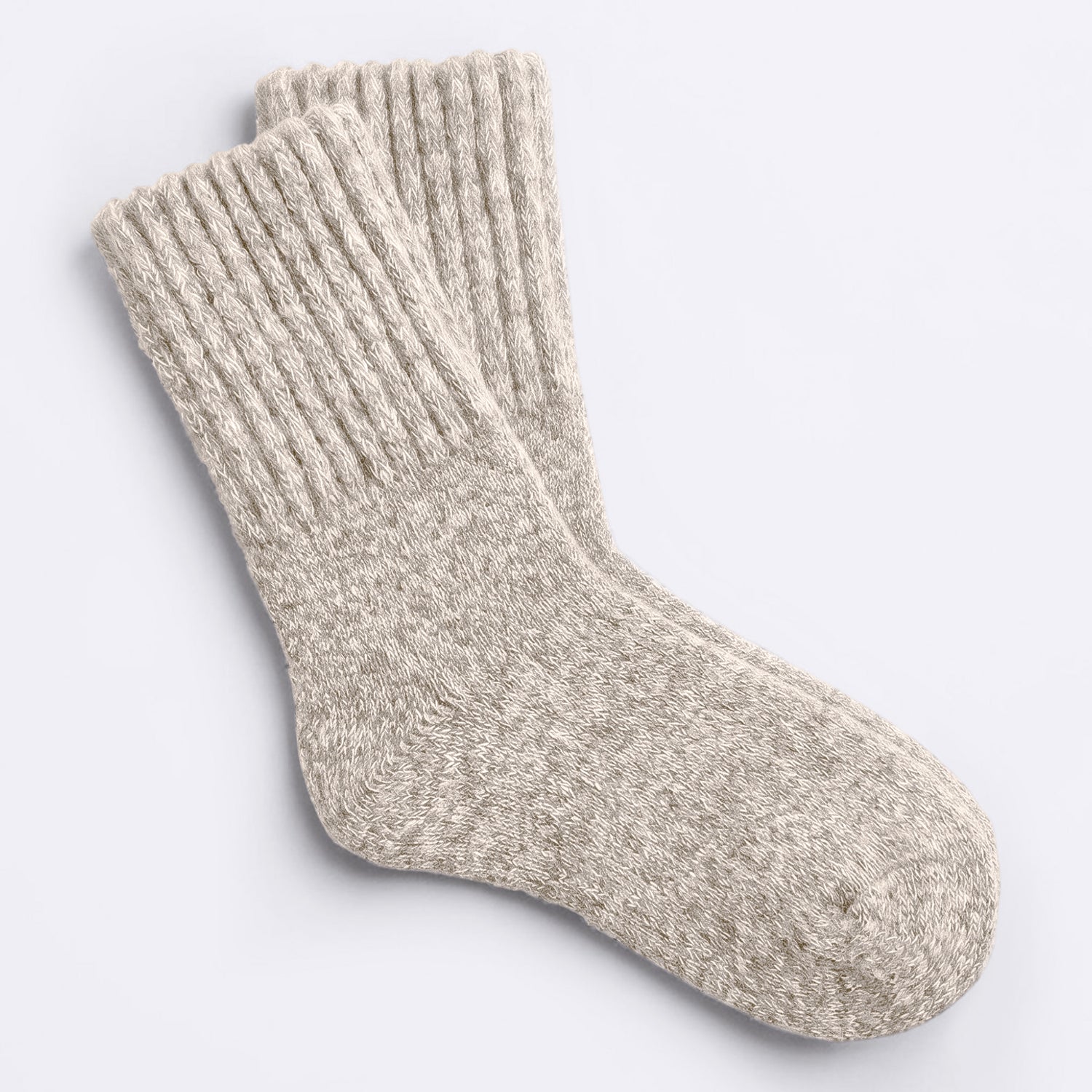 A pair of oatmeal tan cozy boot socks shown on a clean, light gray background.