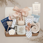 Baby gift box from Wildflower Pop, featuring a mug, rattle, and other items.