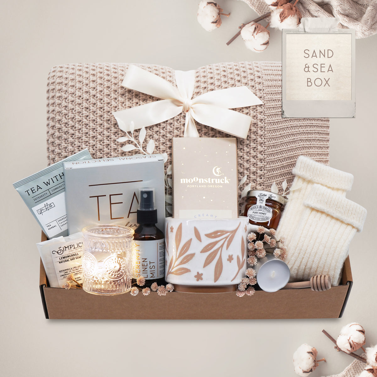 Sand and Sea cozy blanket gift box with honeycomb knit throw, tea, mug and chocolate