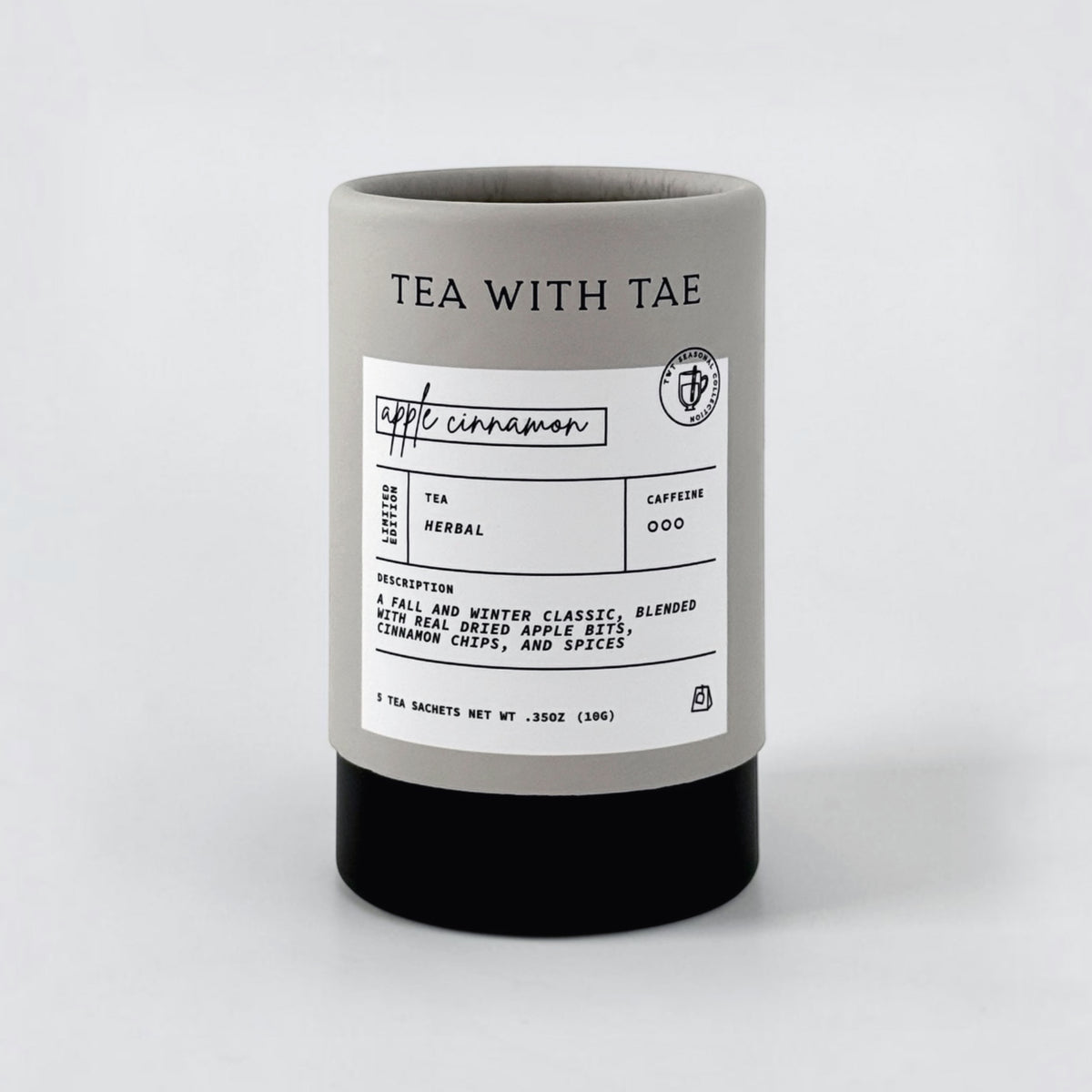 Apple cinnamon tea tube on grey background