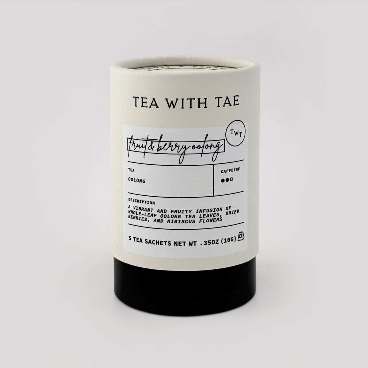 Fruit & berry oolong tea tube on grey background