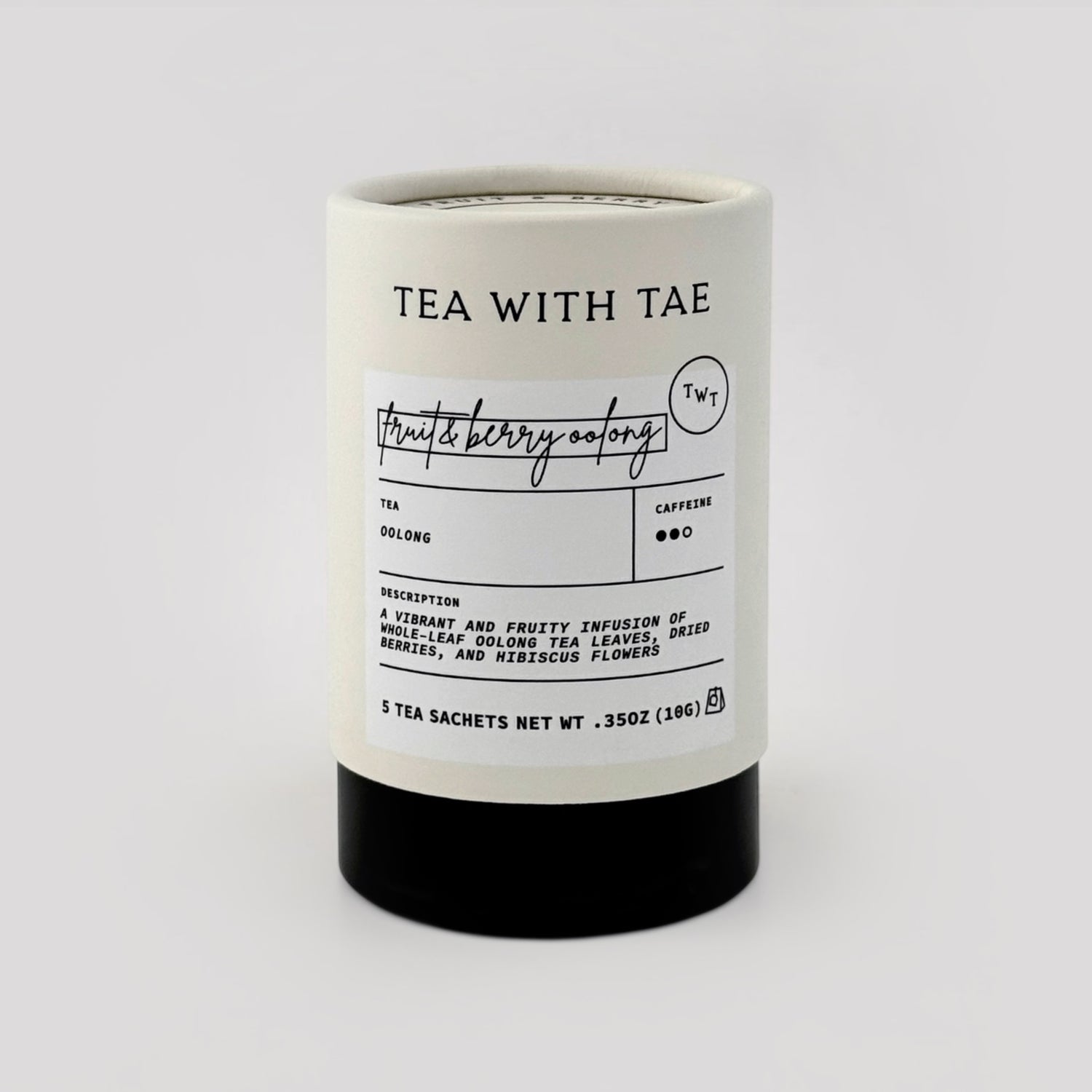 Fruit & berry oolong tea tube on grey background