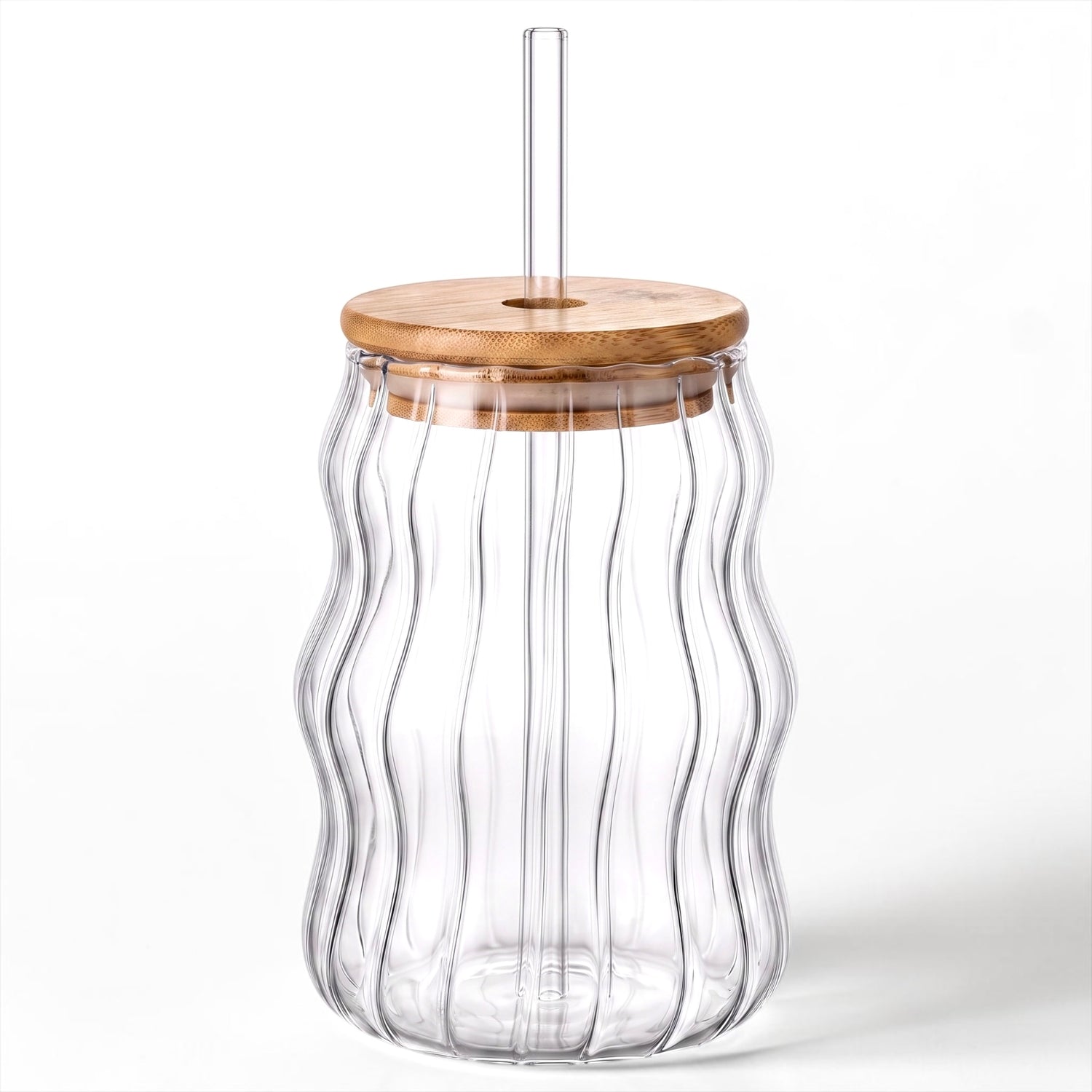 A clear ribbed glass tumbler with a wavy vertical shape, featuring a light natural wood lid and a clear plastic straw, shown on a white background.