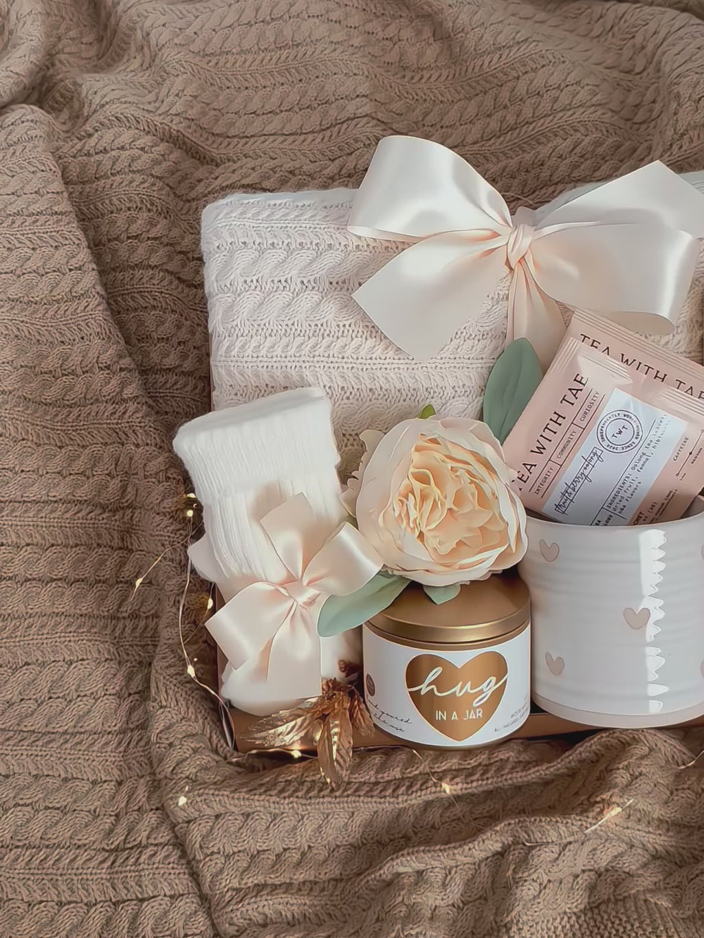 A video of the contents of the Cozy Warm Hug box by Wildflower Pop 
